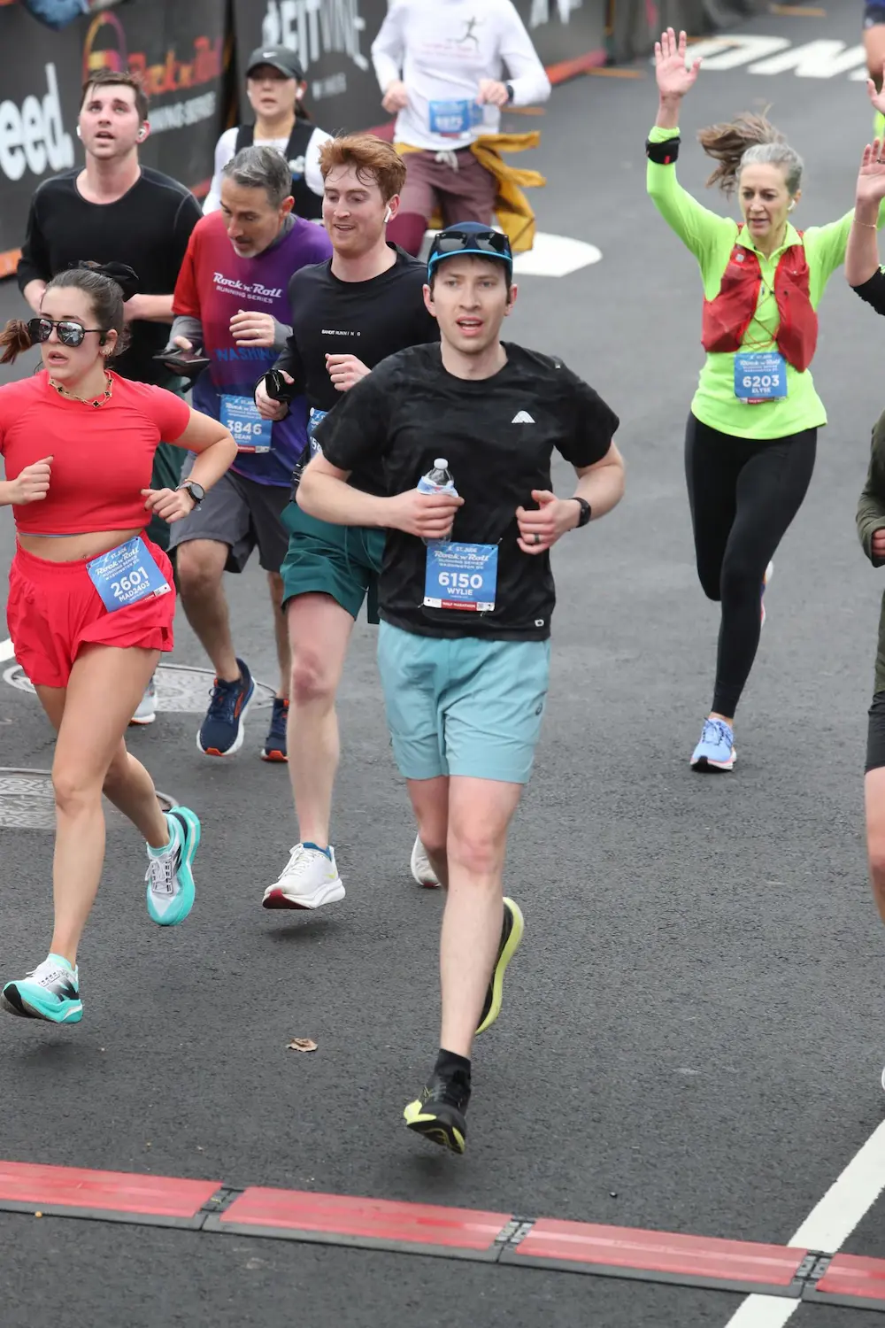 Runners competing in a marathon race event.
