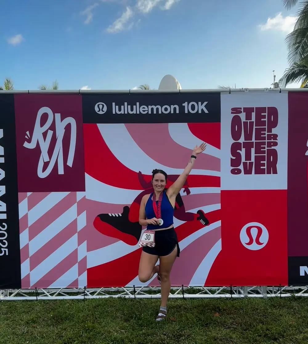 Runner celebrates at Lululemon 10K finish line.