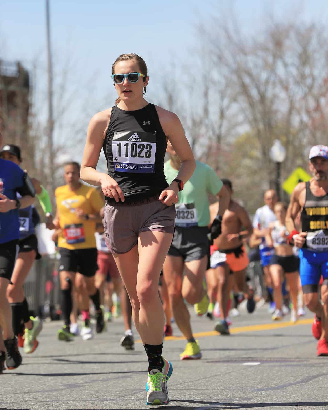 Athletes running in a city marathon event.